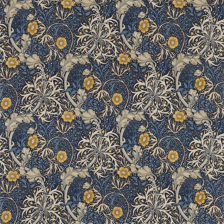 an ornate blue and yellow wallpaper with flowers on the left hand side, is shown in full color