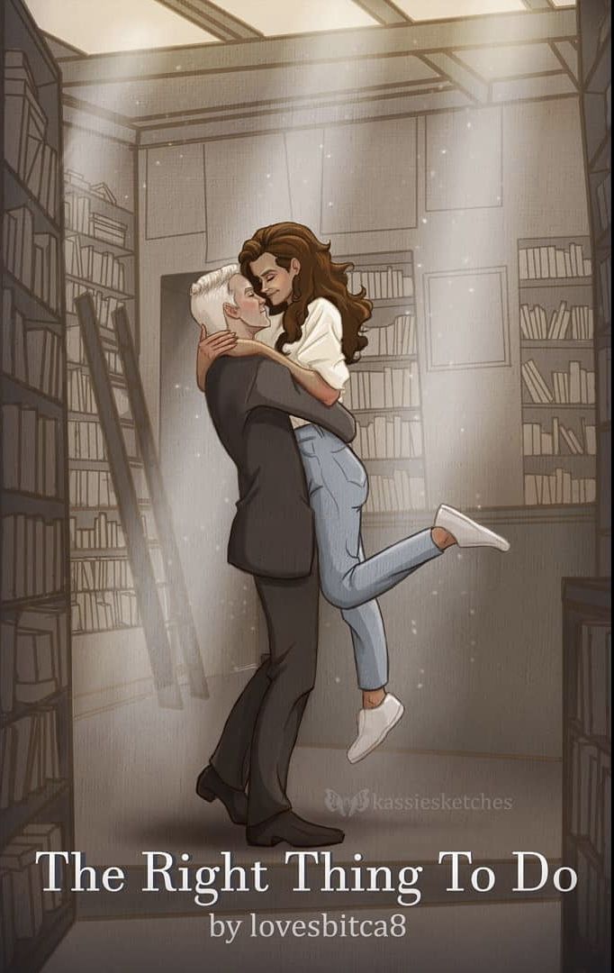 a man and woman hugging each other in front of a book shelf filled with books