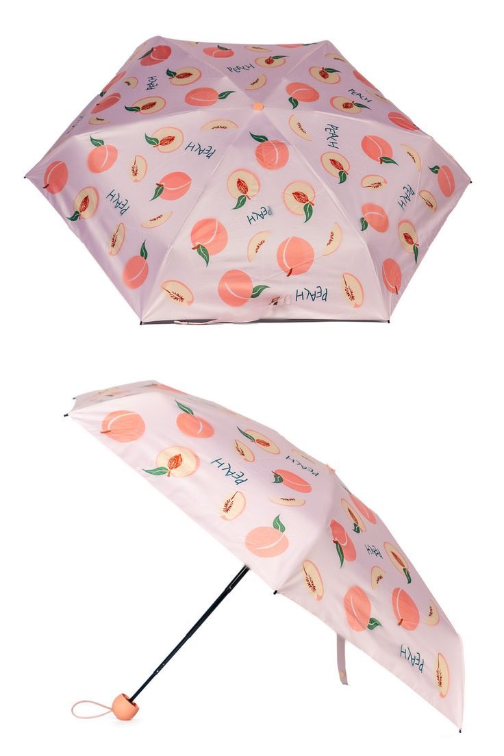 an umbrella with peaches printed on it