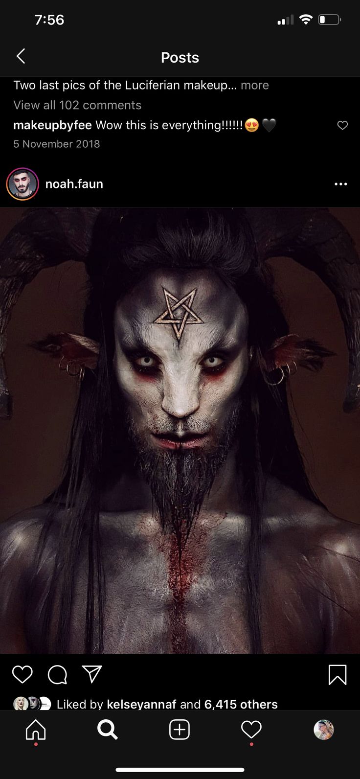 an image of a man with makeup on his face and demon horns around his neck