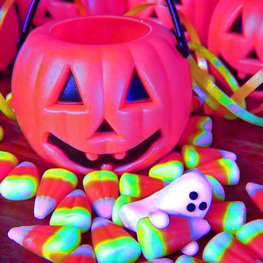 there are many candy candies in the shape of pumpkins and jack - o'- lanterns