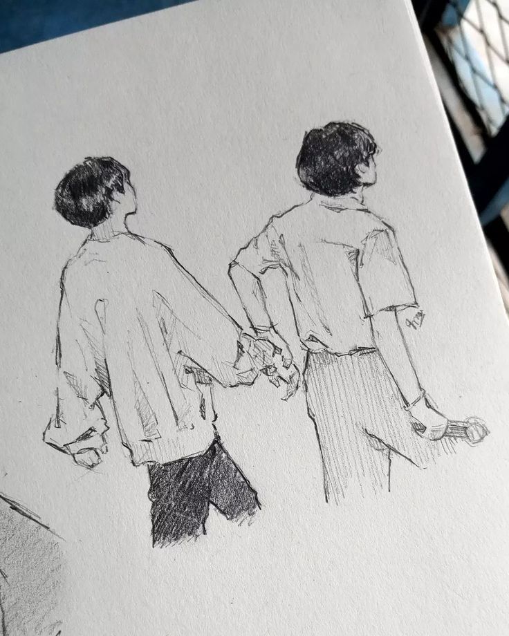 a drawing of two people holding hands