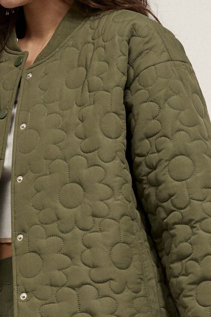 Quilted twill jacket. Allover floral pattern. Side pockets. Low-cut standing collar. Snap button front closure. Long sleeves. Drop shoulder. Rib-knit trim at collar and cuffs. Curved shirttail hem. Lined. Relaxed fit. 100% Rayon. Imported. Designed in LA. Model wears size S. Muted Green, Quilt Jacket, Woven Jacket, Twill Jacket, Standing Collar, Vintage Canvas, Iron Decor, Floral Chiffon, Quilted Jacket