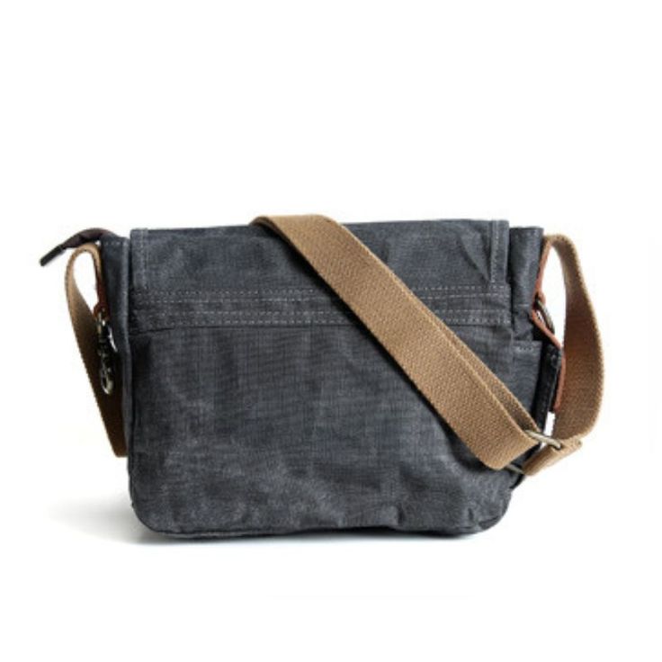 The Men's Canvas Shoulder Bag is a stylish choice for men who are looking for a practical and masculine bag. Made of sturdy canvas with a vintage look, this bag is built to last! A Small Waxed Canvas Crossbody Bag ideal for your travels The men's canvas shoulder bag has a very masculine look with its sleek and stylish design. The flap with snap adds a touch of sophistication to your outfit. The choice of canvas as the material of manufacture adds a vintage touch that will appeal to retro style l Casual Canvas Satchel With Waxed Finish, Waxed Canvas Crossbody Bag For Travel, Classic Waxed Canvas Shoulder Bag For Outdoor, Rugged Canvas Bags With Pockets, Travel Waxed Canvas Crossbody Bag, Rugged Canvas Shoulder Bag For Travel, Rugged Shoulder Bag With Canvas Lining For Everyday Use, Rugged Shoulder Bag With Canvas Lining For Travel, Rugged Canvas Bags With Large Capacity