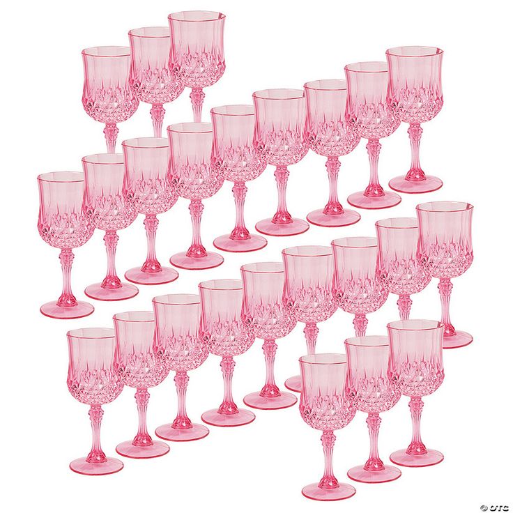 a set of twelve pink goblets sitting next to each other on a white background