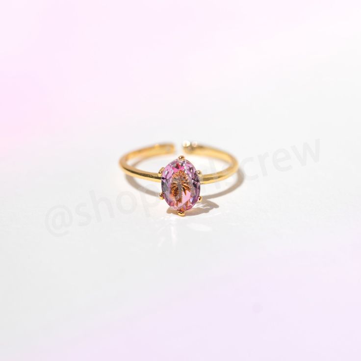 With colors so radiant, our Bursting With Love Ring is the perfect piece to make a statement. Shine brighter than the rest with this beautifully pink ombré ring. 18k gold plated, 18k rose gold plated, or rhodium plated over brass with a protective coating Cubic zirconia stones Approx 1cm width Slightly adjustable band Shop our entire Gradient Stone Collection here Adjustable Pink Rings For Proposal, Pink Crystal Promise Ring With Prong Setting, Pink Open Ring Jewelry With Prong Setting, Pink Open Ring With Prong Setting Jewelry, Pink Prong Set Open Ring Jewelry, Pink Gemstone Jewelry For Proposal, Pink Gemstone Birthstone Ring With Open Shape, Pink Open Ring Jewelry For Proposal, Pink Open Ring For Proposal