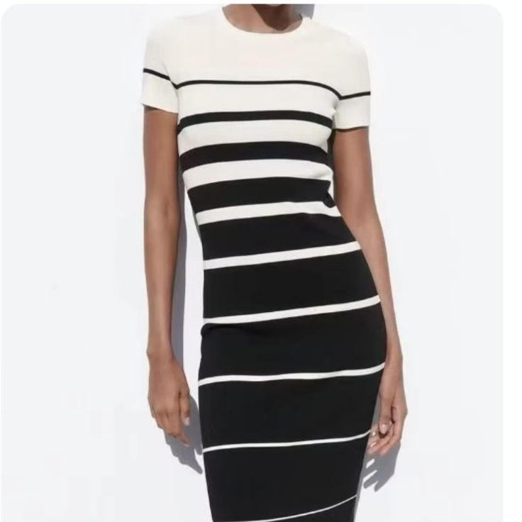 Black And White Striped Knit Maxi Dress. Never Been Worn. New With Tags. Chic Knit Short Sleeve Dresses, Chic White Knit Midi Dress, Elegant Black Crew Neck Mini Dress, Elegant Black Mini Dress With Crew Neck, White Chic Crew Neck Mini Dress, White Knit Dress With Short Sleeves, White Knit Short Sleeve Dress, White Bodycon Sweater Dress Midi Length, White Bodycon Midi Sweater Dress