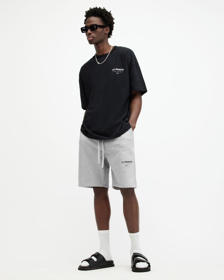 Time to relax in the Underground Sweat Shorts. From Tokyo to London, this is your favourite logo. They're made from organic cotton in an easy silhouette that's got a relaxed fit. Complete with a drawcord waistband and four pockets. Refined stitching details are a premium finish to this casual staple.   Short length Back pockets Drawstring waist Side pockets AllSaints signature branding Mesh lining Short Shorts Men Outfit, Sweat Shorts Outfit Men, Short Outfits Men, Fleece Shorts Outfit, Short Pants Outfit Men, Grey Shorts Outfit Men, Sweat Shorts Outfit, Grey Shorts Outfit, Shorts Outfit Men