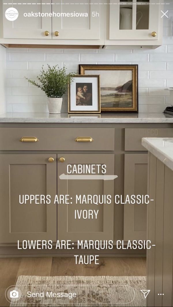 an image of a kitchen with white cabinets and marble counter tops in gold trimmings