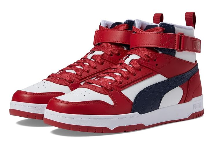 a pair of red, white and blue sneakers on a white background with the word puma