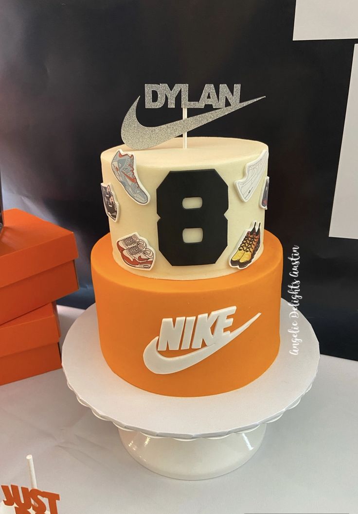 a cake that is sitting on top of a table with the number 8 on it