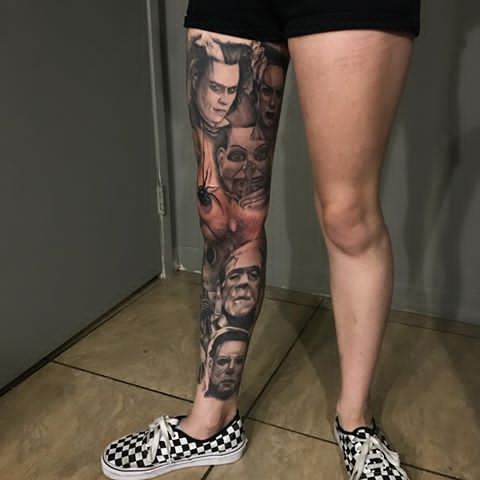 a woman's legs with tattoos on them