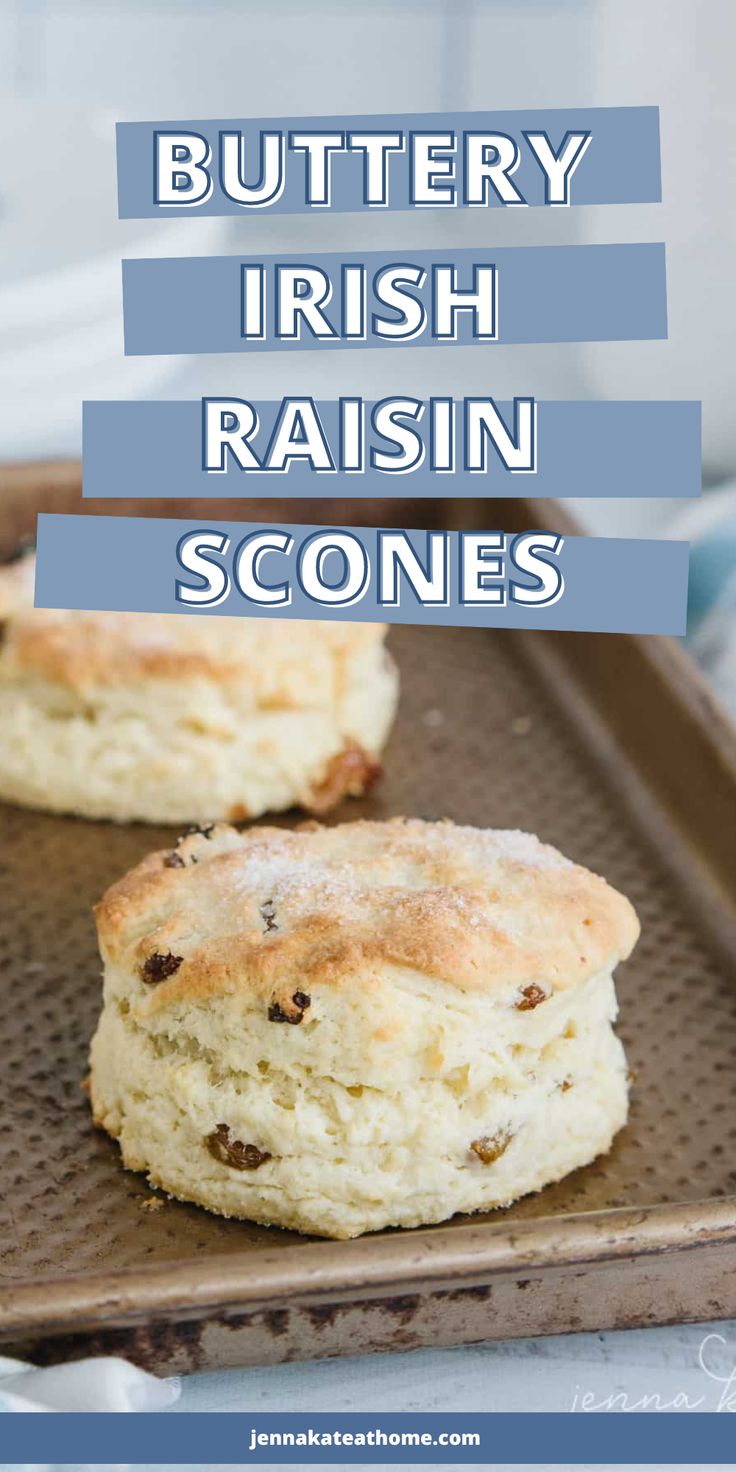 buttery irish raisin scones on a baking sheet with text overlay that reads, buttery irish raisin scones