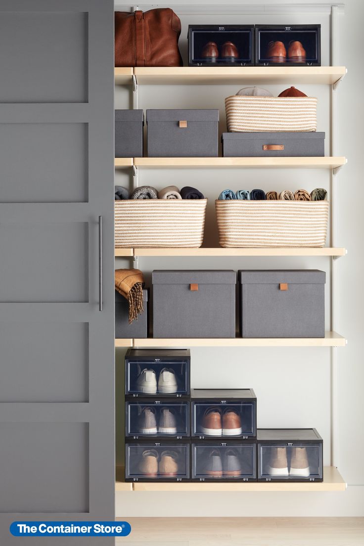 an organized closet with baskets and shoes