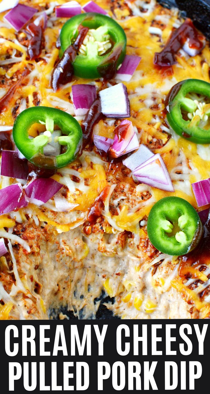 a cheesy pulled pork dip with jalapenos and onions on top