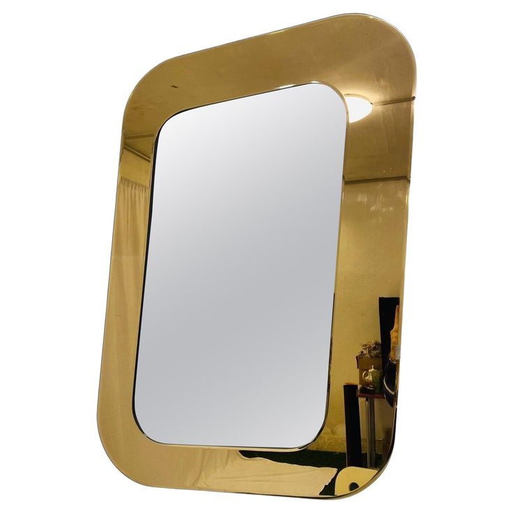 a mirror that is sitting on top of a table