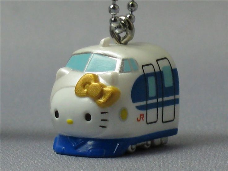 a white and blue hello kitty bus charm on a chain