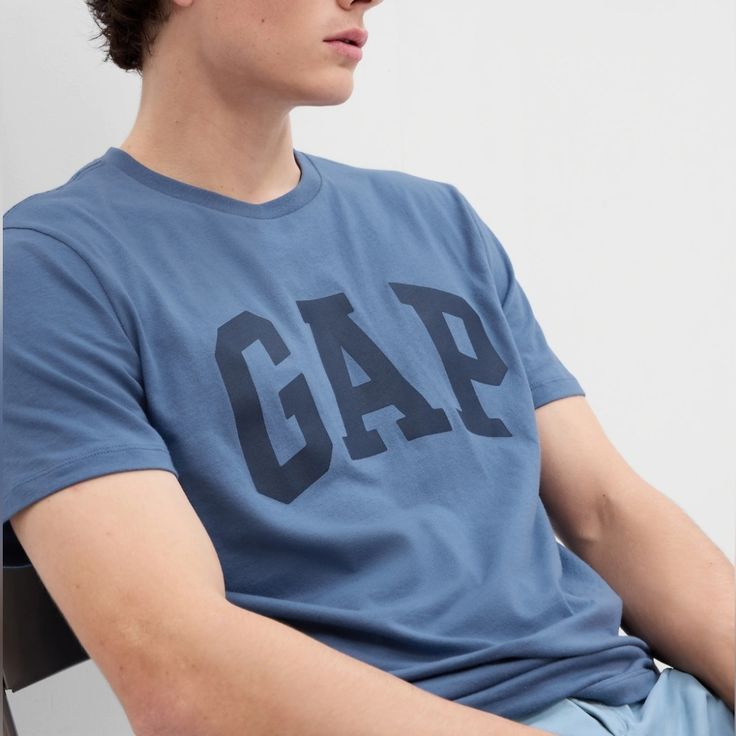 Straight Essy Fit Soft Knit Short Sleeves Crewneck Gap Logo Front Gap Sporty Relaxed Fit Tops, Gap Casual Relaxed Fit T-shirt, Sporty Crew Neck Tops By Gap, Sporty Crew Neck Tops From Gap, Sporty Cotton Tops By Gap, Gap Cotton Tops With Logo Print, Sporty Letter Print Tops By Gap, Sporty Gap Tops With Letter Print, Sporty Letter Print Tops From Gap