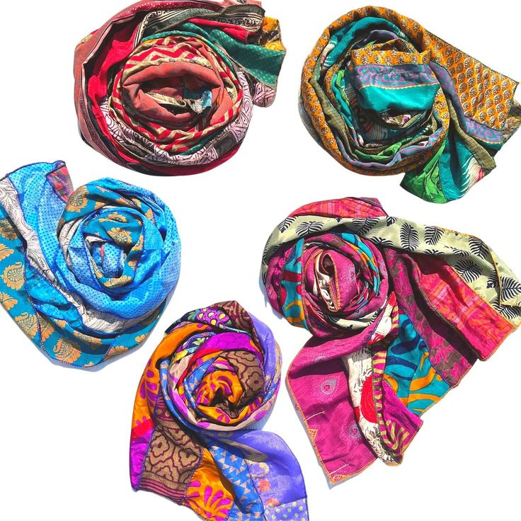 Why we love it! More than just a scarf! Travel to a colorful new land with your bright, beautiful scarf! Do you want to add some color and spice into your wardrobe this spring, or add that something extra to your outfit when the temperature starts to drop? Well we have just the thing for you! These sari silk medley scarves are made with 7 different strips of brightly colored sari material and each one is a mystery waiting to be unraveled. Dress boldly and colorfully in any season with one of our Multicolor Silk Scarf For Festival, Multicolor Silk Scarves For Festivals, Bohemian Multicolor Festive Scarves, Festive Multicolor Bohemian Scarves, Festive Bohemian Multicolor Scarves, Festive Bohemian Multicolor Scarf, Multicolor Dupatta Scarf For Festival, Festive Multicolor Silk Scarves, Bohemian Multicolor Silk Scarf For Festivals