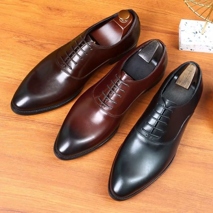 Introducing our LuxeLeather Classy Oxford Dress Shoes, the epitome of sophistication and style. Crafted with the finest quality genuine leather, these shoes are designed to elevate your formal attire to new heights. With a classic lace-up closure, these Oxford dress shoes offer a secure and adjustable fit, allowing you to walk with confidence and grace. Elevate your style game and experience the ultimate blend of comfort and sophistication. Formal Oxford Lace-up Shoes With Goodyear Welt, Elegant Plain Toe Oxfords For Derby, Fitted Pointed Toe Oxfords For Business Casual, Timeless Fitted Pointed Toe Oxfords, Fitted Oxfords With Round Toe For Semi-formal Occasions, Fitted Plain Toe Oxfords For Semi-formal Occasions, Goodyear Welted Lace-up Business Shoes, Classic Lace-up Dress Shoes For Wedding, Timeless Oxford Lace-up Shoes For Formal Occasions