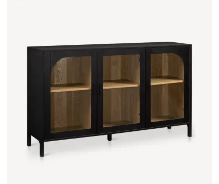 a wooden cabinet with glass doors and shelves on the bottom, black legs and wood top