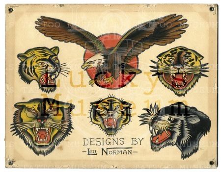 an old fashioned metal sign with tiger and eagle designs