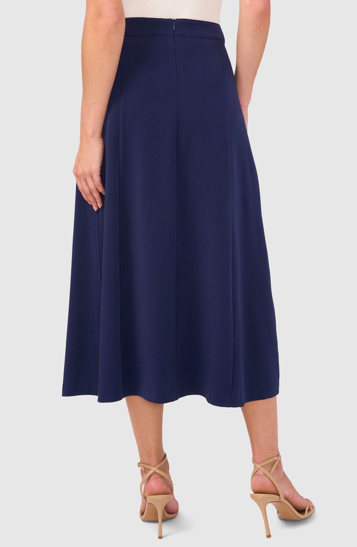 Crisp pleats lend graceful movement to this versatile A-line midi skirt that's ideal from desk to dinner. 33" length Hidden back-zip closure Front slant pocket Lined 68% polyester, 28% rayon, 4% spandex Machine wash, tumble dry Imported Modern A-line Skirt For Workwear, Modern A-line Lined Skirt, Formal A-line Bottoms With Box Pleat, Stretch Midi-length Pleated Skirt For Workwear, Stretch Midi Length Pleated Skirt For Work, Chic Blue A-line Maxi Skirt, Flowy A-line Skirt For Evening, A-line Evening Skirt With Box Pleat, Elegant A-line Maxi Skirt For Work