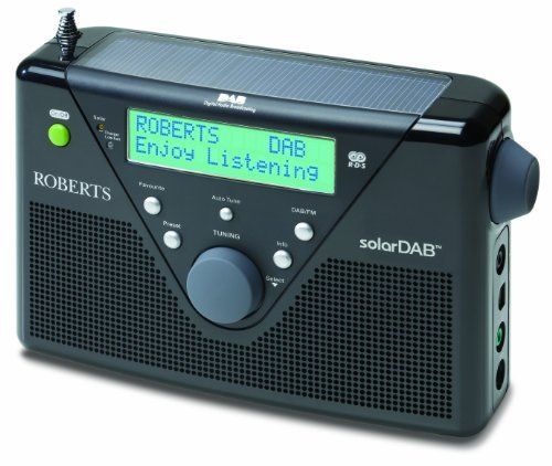 an alarm clock radio sitting on top of a white surface with the words roberts's enjoy listening