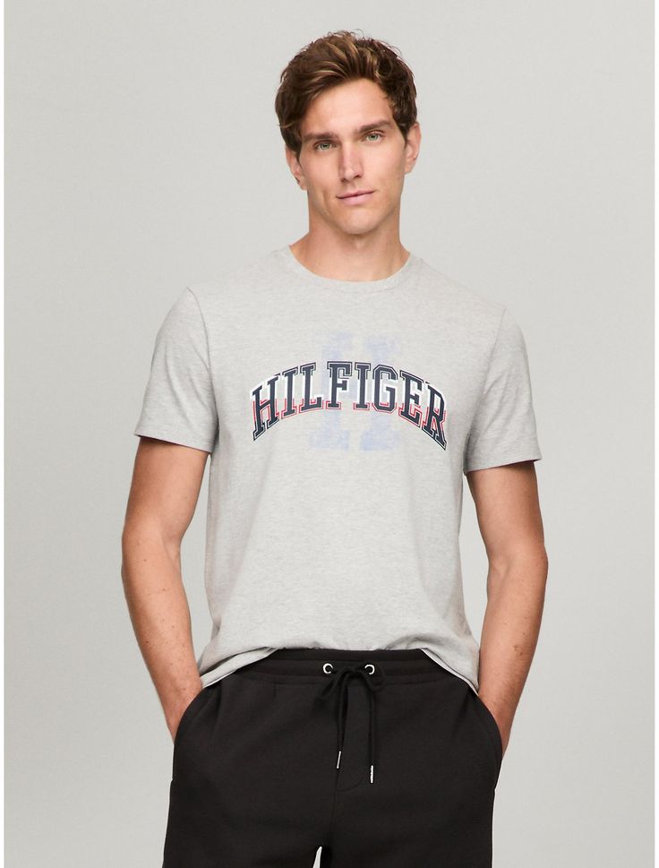 Tommy Hilfiger men's T-shirt. Made from lightweight cotton jersey, known for its breathability and stretch, our comfortable crewneck tee is cut in an easy fit and finished with our Hilfiger graphic.  Material: 100% Cotton. Tommy Hilfiger Crew Neck T-shirt With Graphic Print, Tommy Hilfiger Graphic Print Crew Neck T-shirt, Tommy Hilfiger Sporty T-shirt With Graphic Print, Tommy Hilfiger Logo Print T-shirt For Streetwear, Tommy Hilfiger Sporty Graphic Print T-shirt, Tommy Hilfiger Relaxed Fit T-shirt With Graphic Print, Tommy Hilfiger Crew Neck T-shirt With Logo, Tommy Hilfiger Crew Neck T-shirt With Letter Print, Tommy Hilfiger Letter Print Crew Neck T-shirt