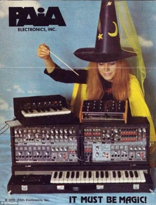 a woman in a witches hat sitting next to an electronic keyboard and amps on the cover of a magazine