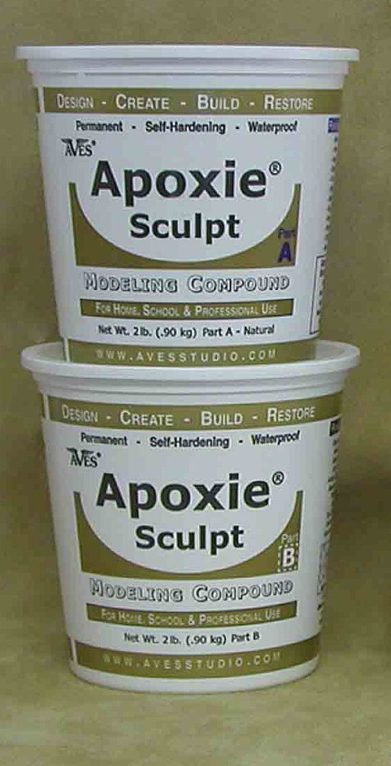 three buckets of apoxie sculpt sitting on a table