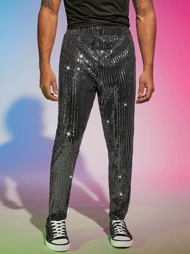 These dress pants feature a unique blend of sequined glitter fabric that adds a fashionable and stylish look to any wardrobe. They are crafted in a slim fit for an enhanced silhouette and come in a variety of colors to match any outfit. They offer a luxurious feel and give any outfit a high-end finish. 94% Polyester, 6% Elastane Imported Pull On closure Hand Wash Only Winter Knit Hats, Glitter Dress, Glitter Fabric, Boot Accessories, Us Man, Silver Sequin, Winter Knits, Mens Sandals, Sunglass Frames