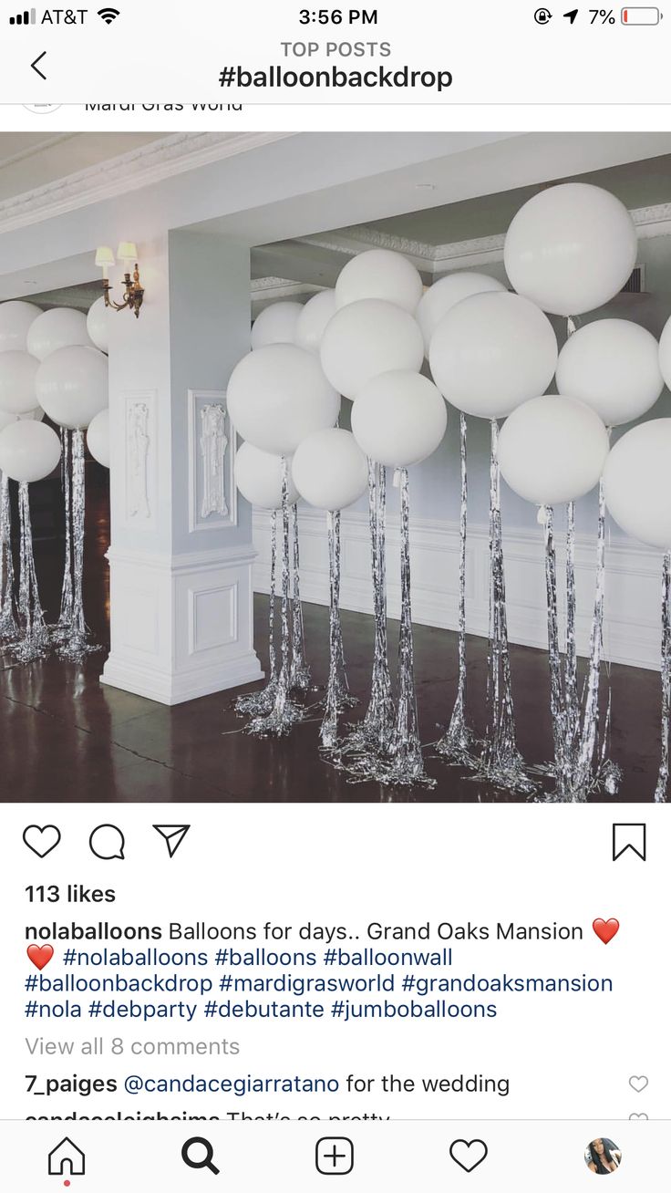 an instagramted photo of balloons in front of a wall