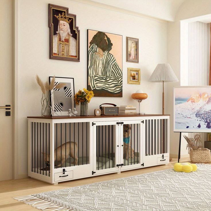 a living room filled with furniture and pictures on the wall next to a rug in front of a window