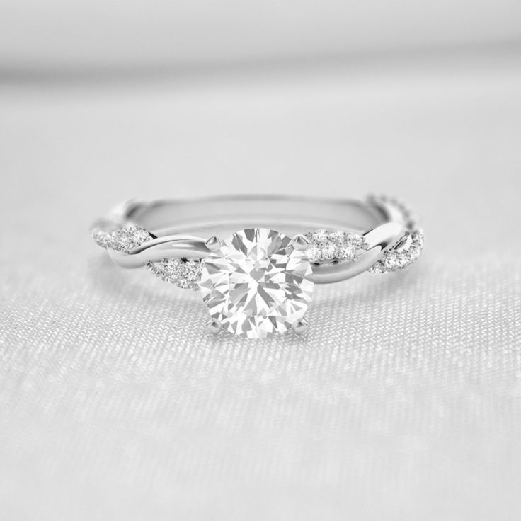 Shown in 1.0 Carat * The Amelia Diamond Twist Engagement Ring | Lisa Robin#_shape-round Ring With Twisted Band, Twist Band Rings, Diamond Ring With Twisted Band, Twisted Ring Engagement, Simple Elegant Engagement Rings Vintage, Small Diamond Ring Engagement, Engagement Rings Low Profile, Twist Band Engagement Rings, Engagement Rings Twisted Band