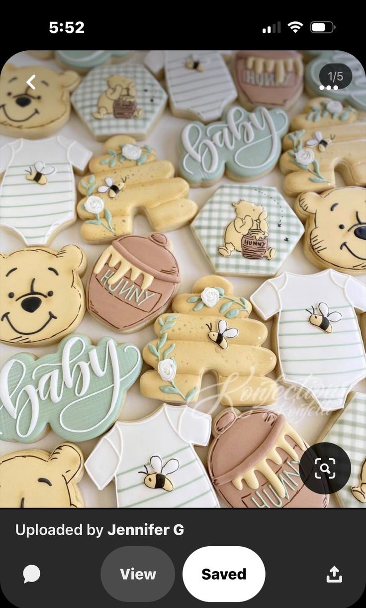 baby shower cookies with teddy bears and onesuits on them are ready to be eaten