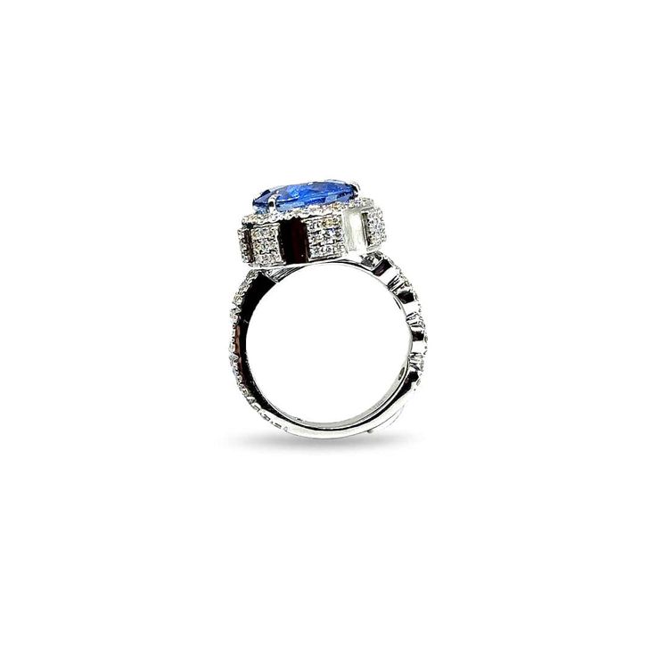 Trinity Cornflower Blue Sapphire & Diamond Ring in 18K White Gold. This ring comes standard in a size 7 but can be sized to any size. Rings that have been sized can not be returned but may be exchanged. 10.54ct Sapphire 1.50ct Diamond 18K Blue Pear-shaped Diamond Ring For Formal Occasions, Pear-shaped Blue Diamond Ring For Formal Occasions, Formal Blue Pear-shaped Diamond Ring, Formal Diamond Flower Ring With Gemstone, Luxury Blue Pear-shaped Sapphire Ring, Elegant Blue Flower Ring For Formal Occasions, Formal Blue Pear-shaped Rings, Formal Oval Flower Ring With Halo Setting, Formal Flower Ring With Oval Halo Setting