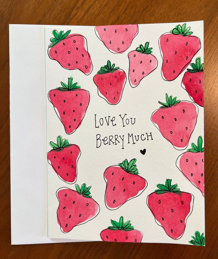 a card with strawberries and the words love you berry much on it's front