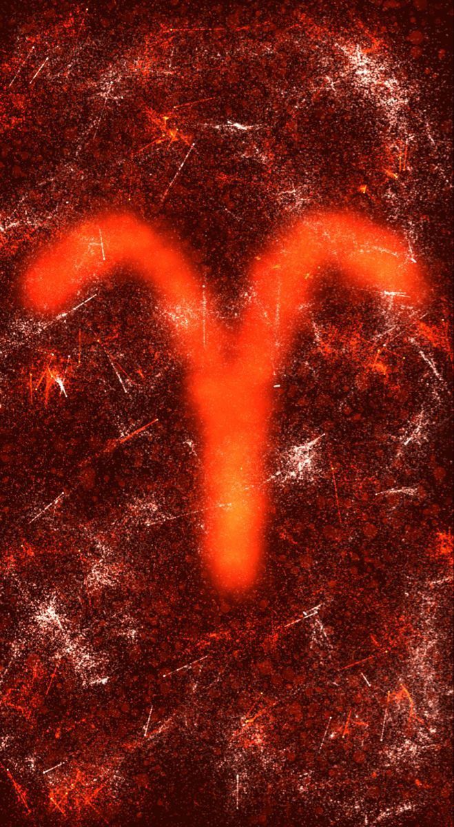 an orange zodiac sign is shown in the middle of a red background with white spots