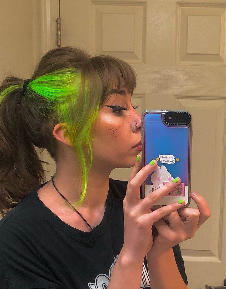 Earloop Peekaboo Highlights, Neon Green Hair Highlights, Green Money Peice Hair, Green Highlights In Black Hair Short, Dark Green Split Dye Hair, 2 Tone Green Hair, Black And Green Color Block Hair, Neon Green Highlights In Black Hair, Neon Green Highlights In Brown Hair