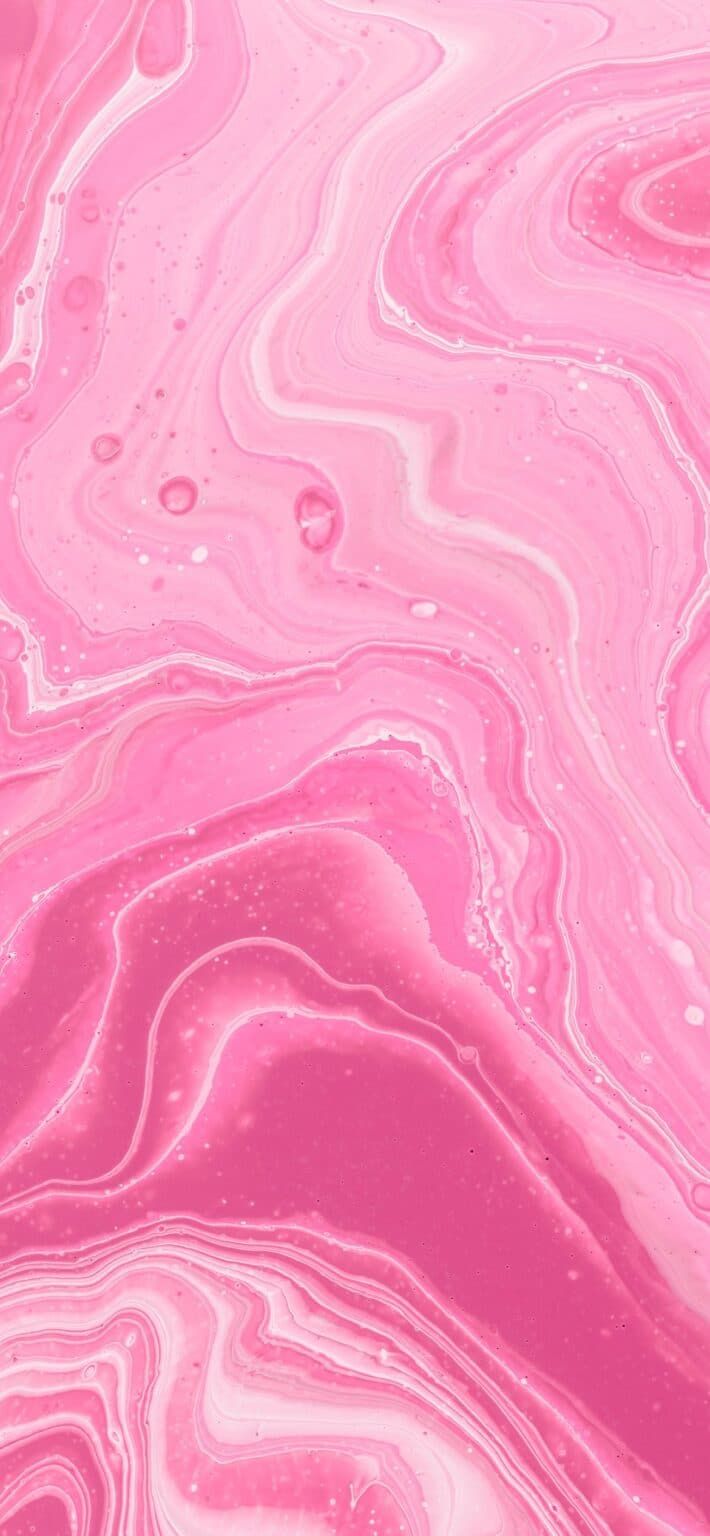 an abstract pink and white marble background