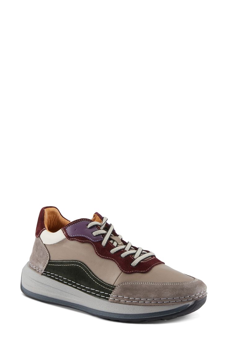 This sporty sneaker is topped with colorblocked leather and grounded on an exaggerated sole. 1 1/2" heel; 1" platform Lace-up style Removable, cushioned insole with arch support Leather upper and lining/synthetic sole Made in Turkey Urban Chunky Sneakers With Round Toe And Branded Insole, Leather Chunky Sneakers With Abzorb Midsole, Leather Chunky Sneakers With Vibram Sole, High-top Leather Wedge Sneakers With Branded Insole, Leather Lace-up Chunky Sneakers With Abzorb Midsole, Leather Chunky Lace-up Sneakers With Abzorb Midsole, Casual Multicolor Sneakers With Contrast Sole, Leather Platform Sneakers With White Vibram Sole, White Leather Platform Sneakers With Vibram Sole