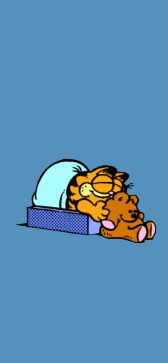 garfield the cat sleeping on top of a box