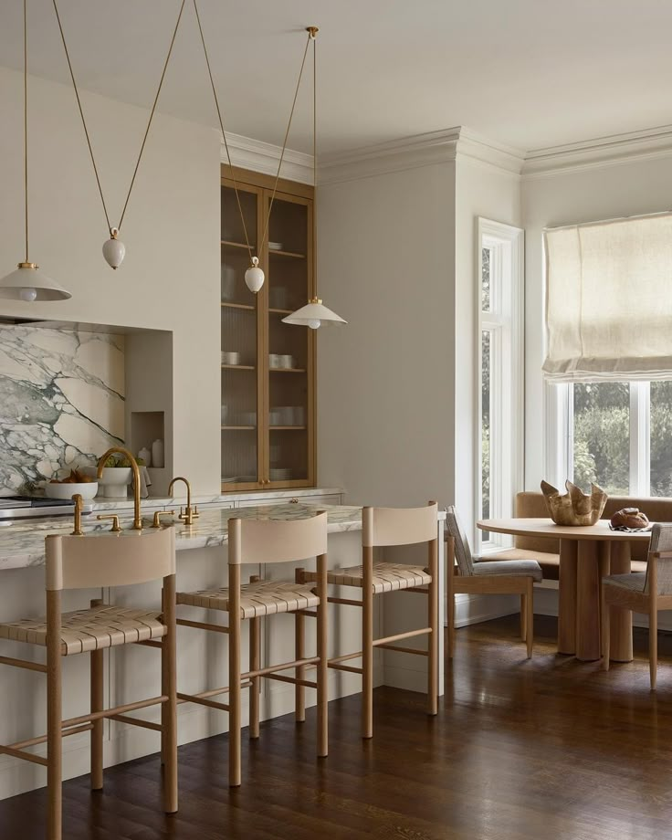 the kitchen is clean and ready to be used as a dining room or breakfast nook