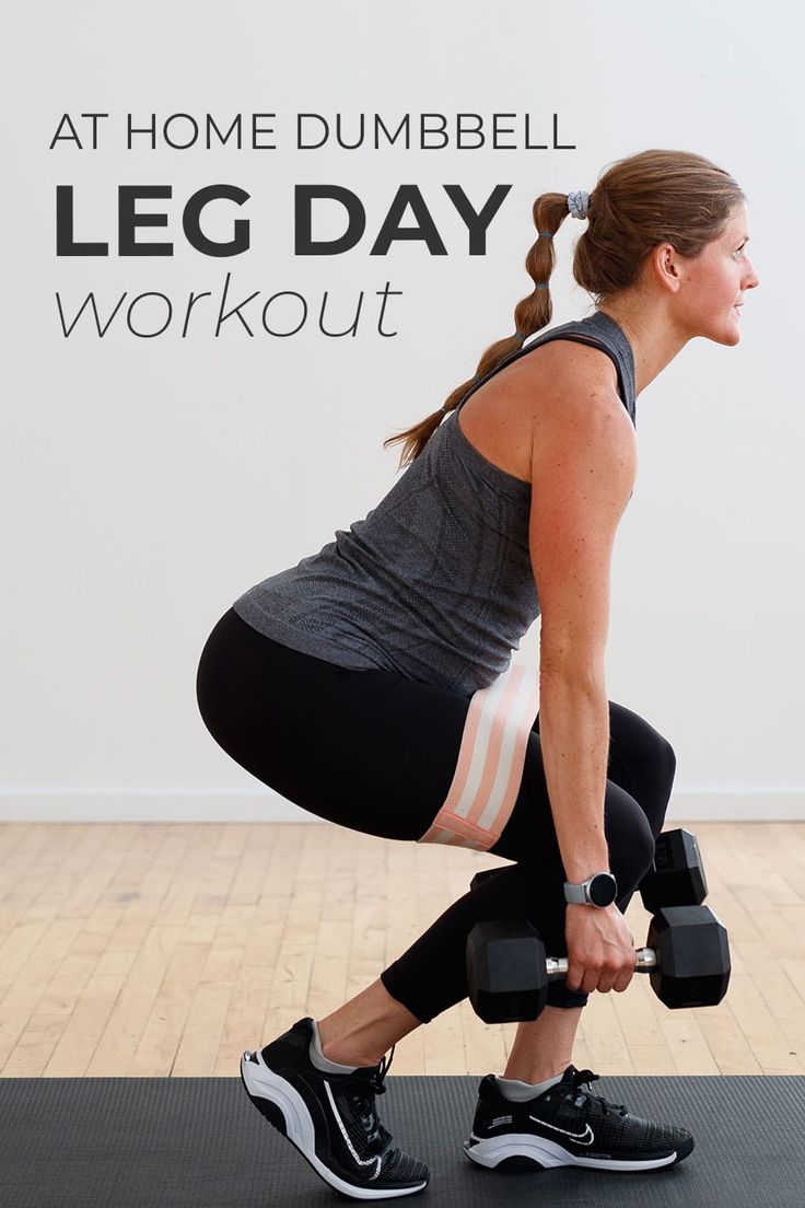 a woman doing dumbbell leg day workout