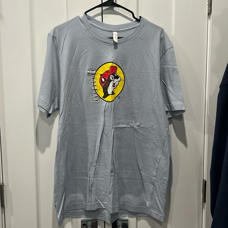 Bucees Light Blue Tee. Never Worn. Xl Cheap Themed Blue T-shirt, Light Blue Crew Neck Shirt For Spring, Casual Blue Top With Screen Print, Casual Blue Screen Print Top, Casual Fitted Shirt With Screen Print, Fitted Casual Shirt With Screen Print, Light Blue Crew Neck Casual Top, Light Blue Casual Crew Neck Top, Casual Light Blue Crew Neck Top