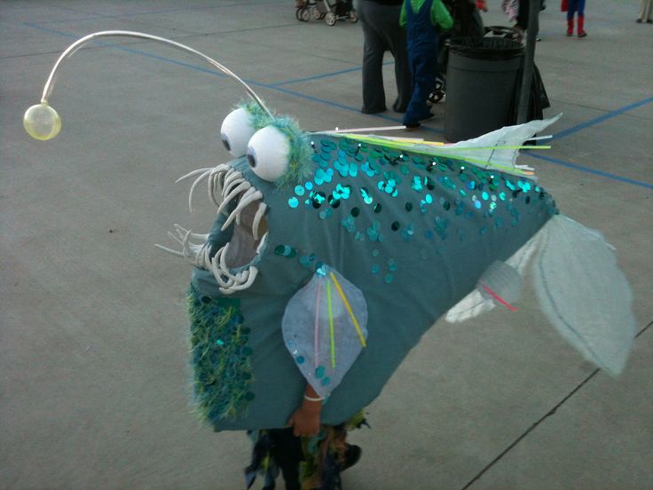 a person is dressed up as a fish