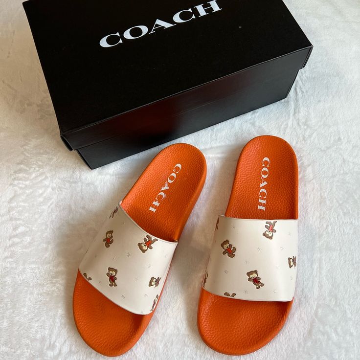 Coach Womens Udele Sport Pool Slides Sandals,Nwt New With Tags Size:10b Color: Chalk/ Brown Coach Brings Sporty Dimension To A Classic Slip-On Profile With Embossed Logo Details On The Effortless Udele Sport Slide Sandals. * Manmade * Manmade Sole * Wipe Clean * Imported Spring Orange Slides, Orange Flat Slides For Spring, Orange Round Toe Slides For Summer, Orange Slides For Spring Vacation, Coach Casual Slip-on Sandals, Trendy Orange Sandals With Cushioned Footbed, Orange Synthetic Slides For Summer, Orange Synthetic Flat Heel Sandals, Orange Flat Synthetic Sandals