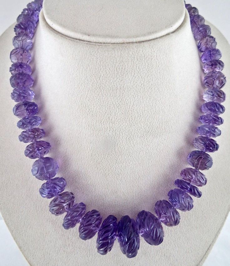 PRODUCT DETAILS LINE 1/782CTS NATURAL AMETHYST CARVED BEADS ALL NATURAL UNHEATED UNTREATED  BEST QUALITY AMETHYST  SIZE OF THE BEADS ARE FROM 22 MM TO 10MM LENGTH OF THE NECKLACE IS 21 INCHES INCLUDING HOOK BEST PRICE OFFERED  FIXED PRICE  925 SILVER HOOK ATTACHED TO THE NECKLACE NOTE - #You will receive the same product you see in picture. #DEAR BUYERS PLEASE FEEL FREE TO ASK QUESTIONS  #WE WILL BE GLAD TO ANSWER & SOLVE QUERY REGARDING THIS PRODUCTS #RETURN POLICY Every piece of jewellery and Beaded Necklace Designs, Aquamarine Stone, Amethyst Beads, Jewelry Design Necklace, Necklace Online, Necklace Designs, Vintage Necklace, That Way, Necklace Etsy