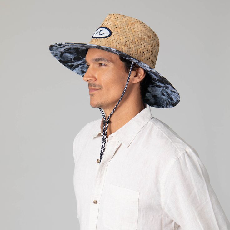 Choose the Mens Straw Lifeguard with Ocean Wave Under-brim, a stylish hat perfect for a day by the beach. Finessed from 100% straw with a 4.5" brim, featuring a unique wave print under-brim, damask woven wave patch, and a pinch crown. UPF 50+ sun protection ensures the safe wear of this fashionable, tropical lifeguard hat. Features: Color: BlueMaterials: 100% StrawBrim Size: 4.5" BrimSize: 59cmSun Protection: UPF 50+ Straw Hat With Curved Brim For Warm Weather, Casual Wide Brim Bucket Hat For Pool, Casual Brimmed Bucket Hat For Pool, Casual Natural Straw Hat For The Pool, Casual Natural Straw Hat For Pool, Casual Curved Brim Bucket Hat For Pool, Casual Brimmed Straw Hat For Pool, Casual Straw Bucket Hat With Upf 50+, Casual Bucket Hat With Curved Brim For Pool